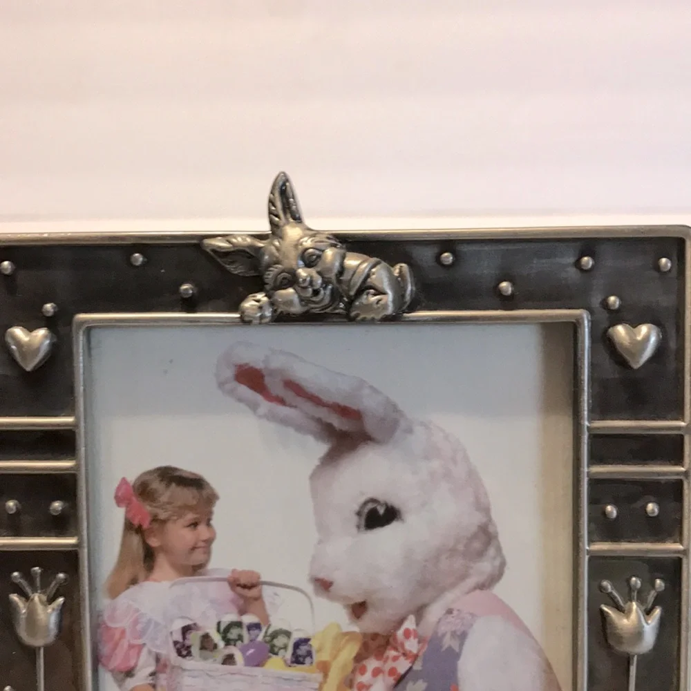 Silver metal rabbit with wheel barrel of eggs picture frame.